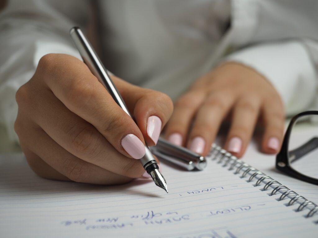 Hands writing