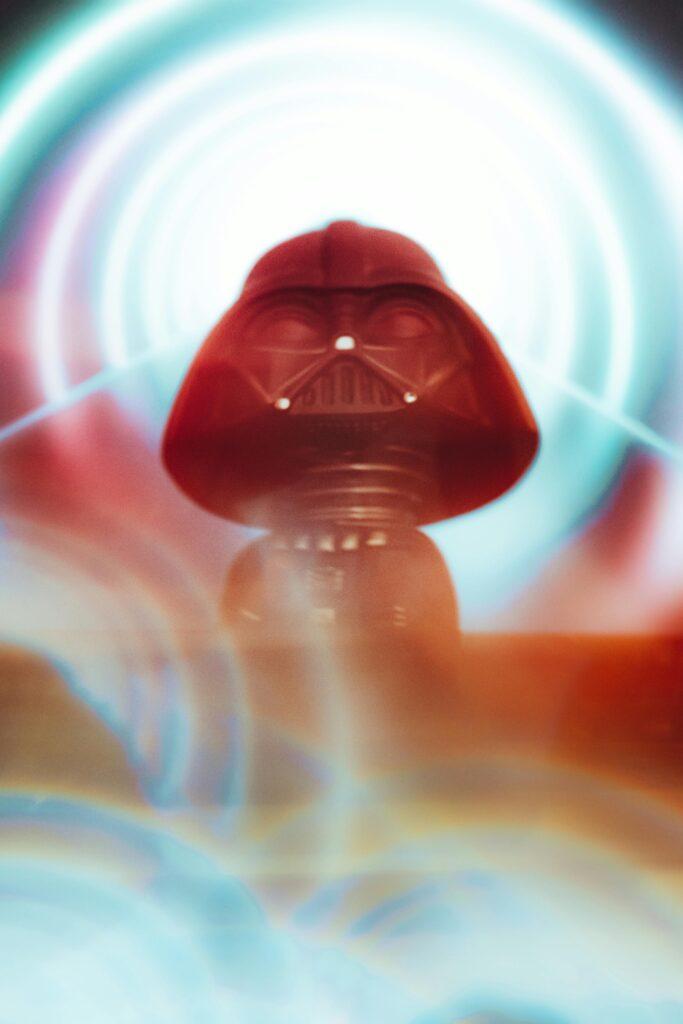 A Lego Darth Vader emerges from a halo of light